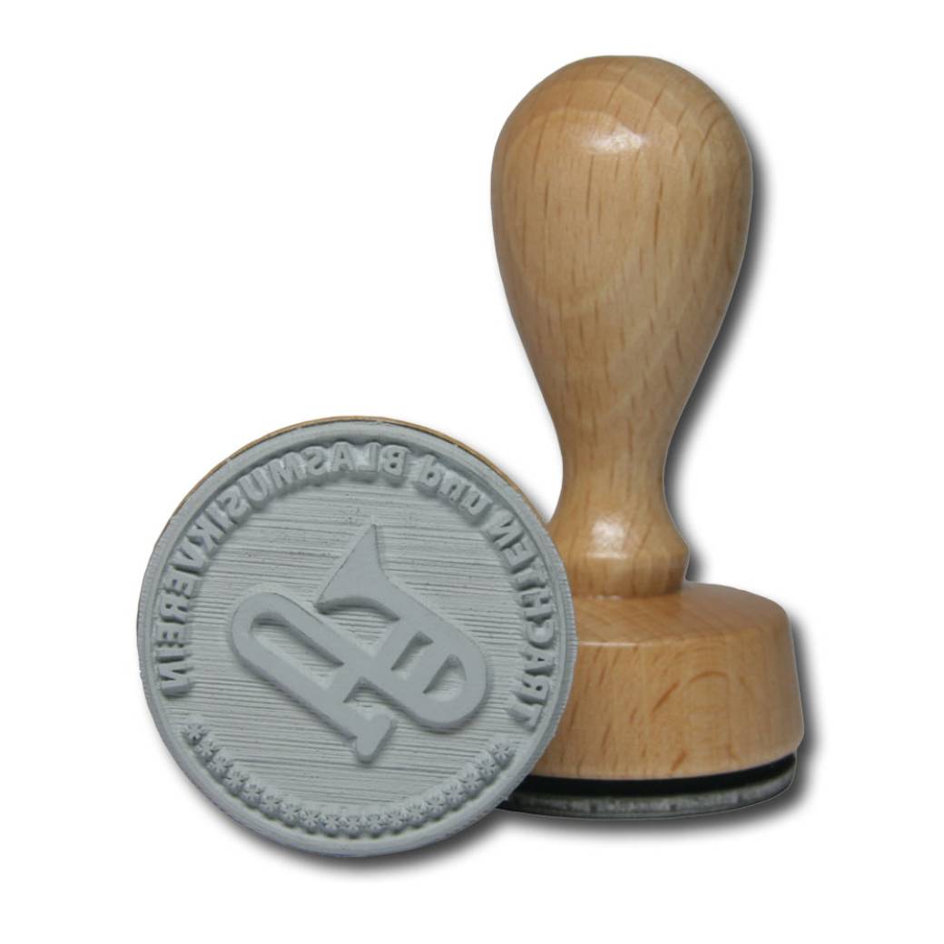 Runder Holzstempel mit einem Durchmesser von 40 mm. Runder Holzstempel mit einem Durchmesser von 40 mm.